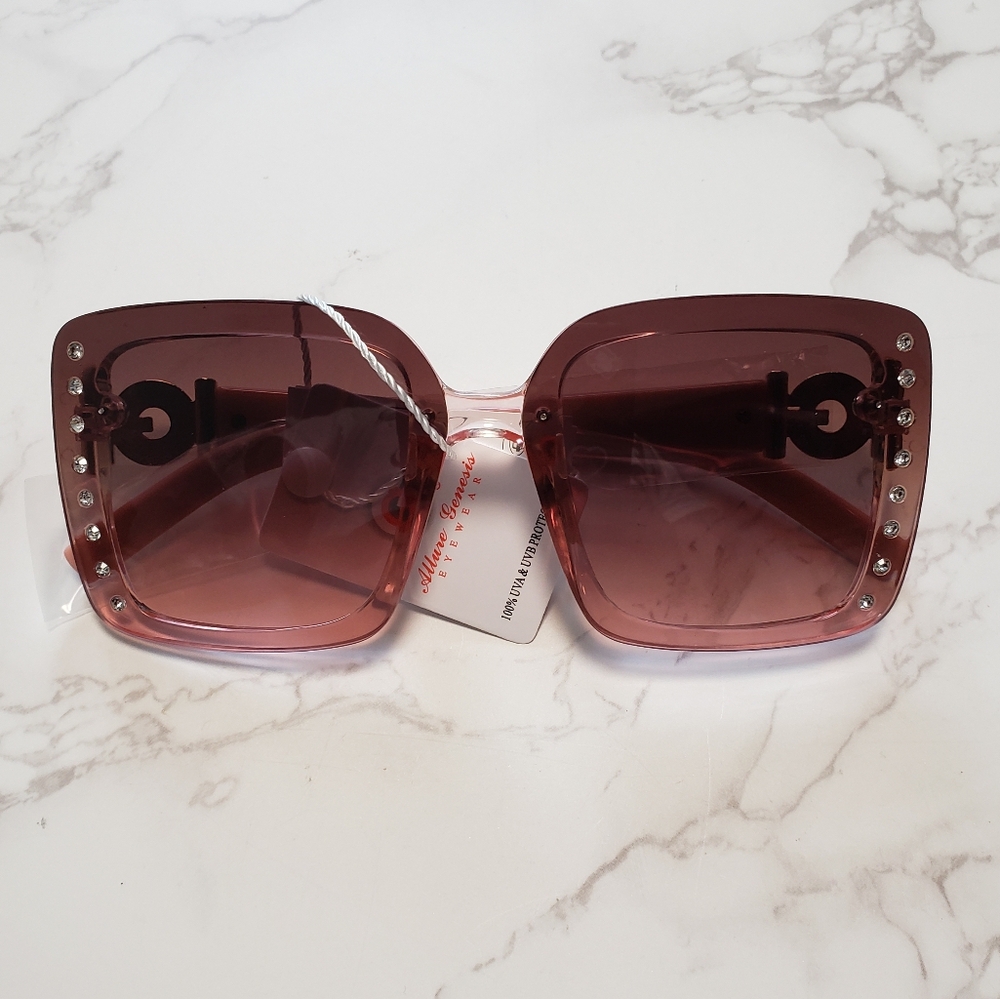 Women's Rhinestone embellished Luxury sunglasses.